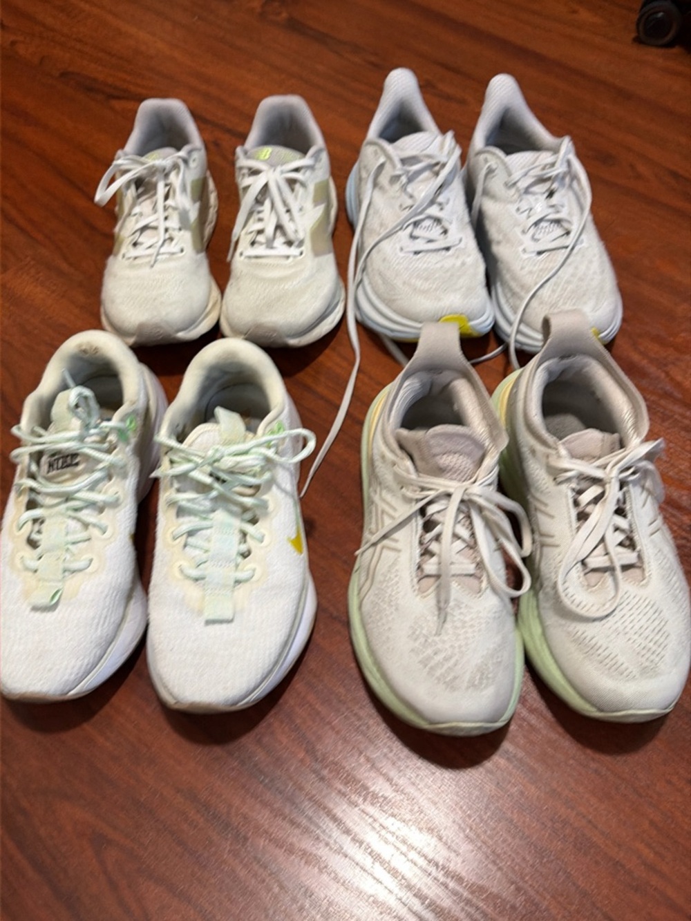 4 Pairs of USED sneakers. NB, Nike, Hoka and Asics